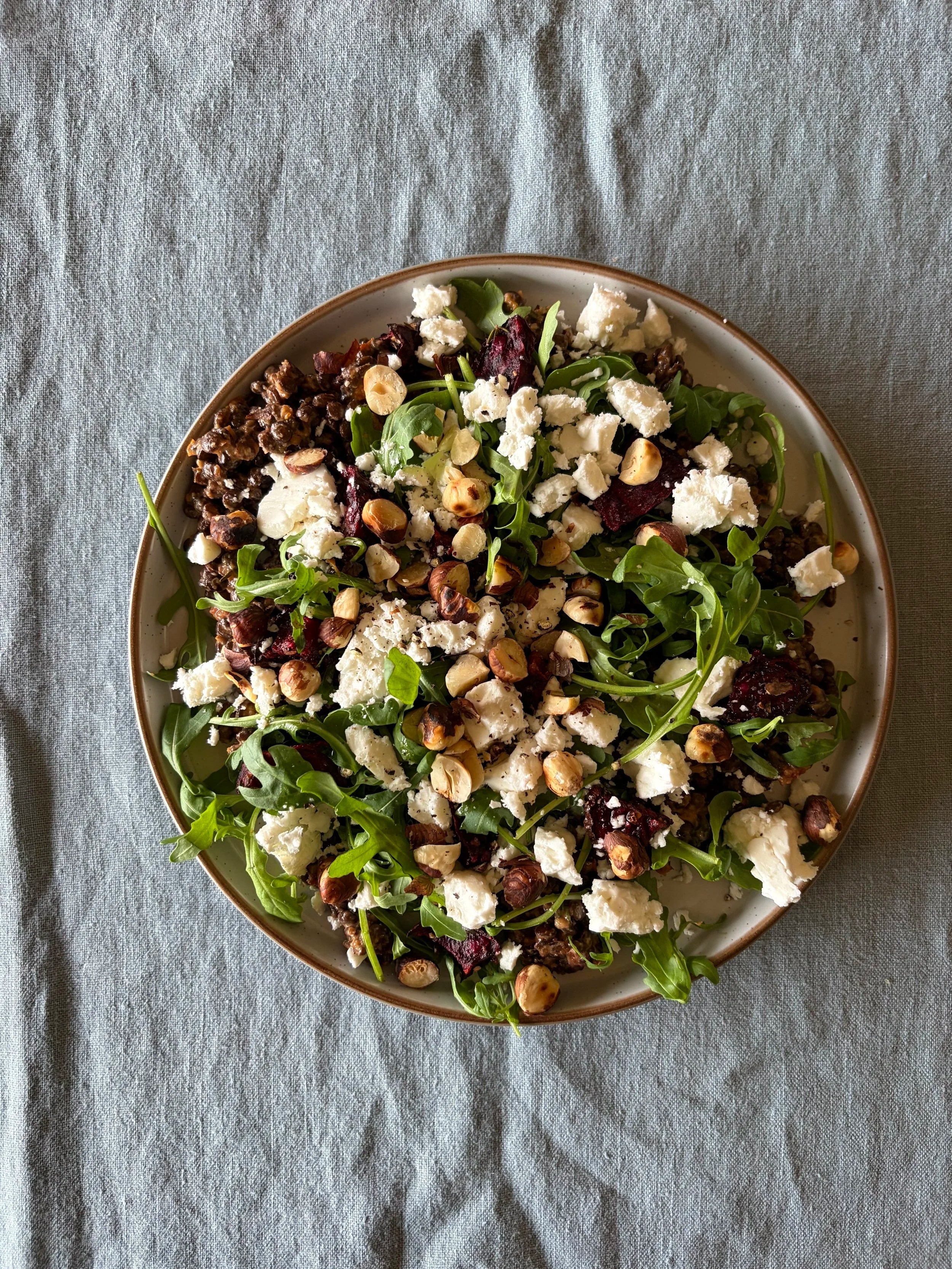 High fibre winter salad with beetroot, hazelnuts and greens, healthy lunch