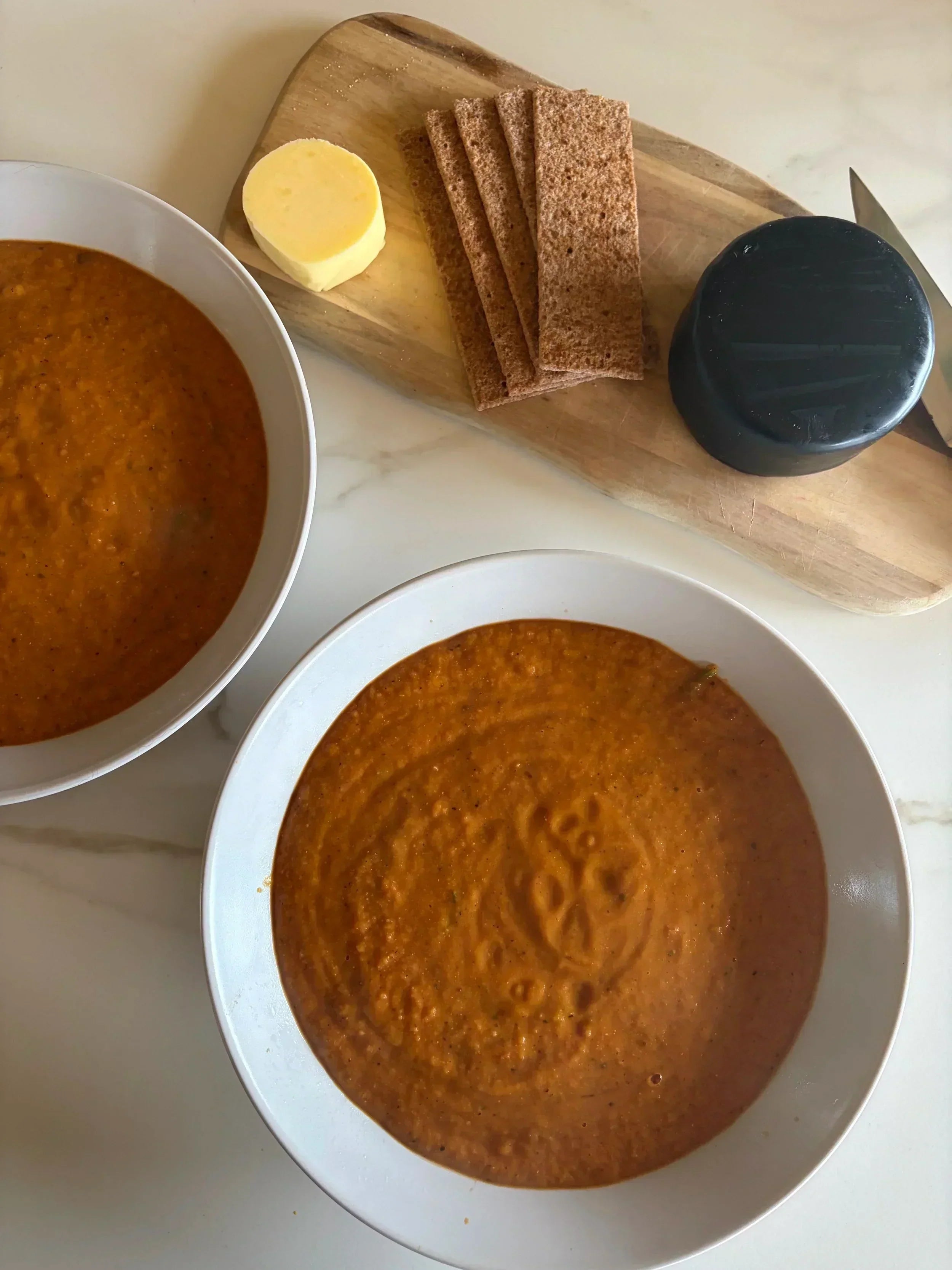 High protein tomato and cannellini bean soup in a bowl, healthy high fibre meal