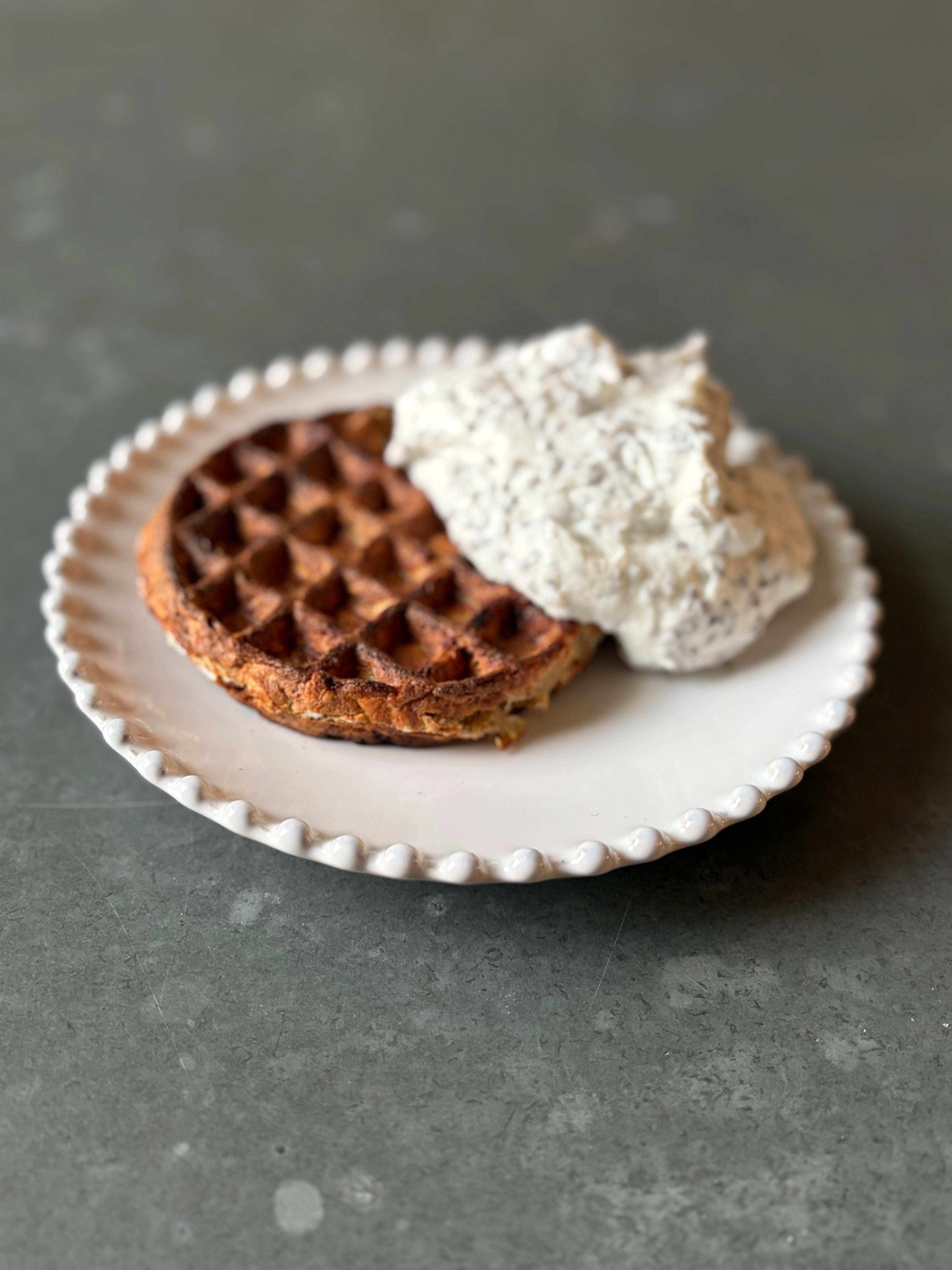 High protein banana waffles with chia yogurt on a plate, healthy breakfast recipe